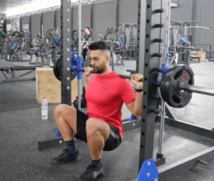 Sentadilla en multipower para piernas
